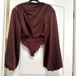 House of CB bodysuit. Size small. Never worn. Still has lining.